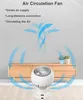 A white air circulation fan is placed on a rug in front of a wooden cabinet. Blue arrows indicate the airflow. Text describes the fan's features. Produktbild-Vorschau