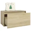 A beige wooden cabinet with a drawer pulled out, and a white tote bag with a green Christmas tree graphic on top. Anteprima dell’immagine prodotto