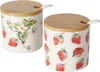 Two ceramic jars with wooden lids and spoons, decorated with strawberry motifs. Produktbild-Vorschau