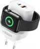 A white VEGER brand charger with two USB ports and a black Apple Watch attached, charging. Podgląd zdjęcia produktu