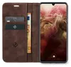 A brown leather flip case for a smartphone, with cards and banknotes inserted. Produktbild-Vorschau