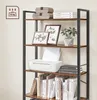 A bookshelf with various items on its shelves, including books, picture frames, a printer, and decorative boxes. Produktbild-Vorschau