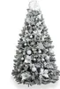 A decorated artificial Christmas tree with a snowy appearance. Podgląd zdjęcia produktu