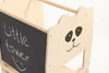 A close-up view of a wooden learning tower with a blackboard. Anteprima dell’immagine prodotto
