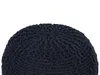 A close-up view of a dark blue knitted pouf on a white background. Náhled obrázku produktu