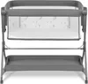 A baby bassinet with a storage tray underneath, shown from the front. Produktbild-Vorschau