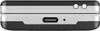 A close-up view of the bottom edge of a flip phone, showing ports and buttons. Náhľad obrázku produktu