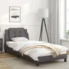 A bedroom scene with a single bed, nightstand, and floor lamp. Produktbild-Vorschau