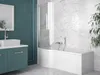 A modern bathroom with a bathtub, sink, and vanity. Voir les images du produit