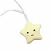 A close-up of a single yellow star-shaped LED light with a cute face, attached to a clear wire. Náhľad obrázku produktu
