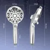 Two views of a silver shower head with dimensions indicated by lines and text. Produktbild-Vorschau