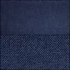 A split image showing two different fabric textures in blue. Produktbild-Vorschau