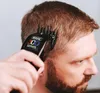 A person is using a Wahl hair clipper to cut their hair. Podgląd zdjęcia produktu