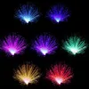 A collage of seven fiber optic lamps in different colors against a black background. Voir les images du produit