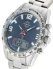 A close-up shot of a men's wristwatch with a blue dial and silver band. Produktbild-Vorschau
