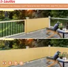 A balcony with a yellow privacy screen and outdoor furniture. Podgląd zdjęcia produktu