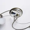 Close-up view of the internal wiring and mounting bracket of a ceiling light fixture. Produktbild-Vorschau
