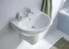 A white ceramic washbasin with a chrome faucet is mounted on a light gray wall, with a green towel hanging to the right. Produktbild-Vorschau