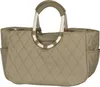 A quilted tote bag with rounded handles and external pockets. Náhľad obrázku produktu