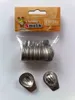 A package of small metal baking molds, possibly for cookies or candies, with two individual molds shown in the foreground. Anteprima dell’immagine prodotto