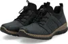 A pair of black sneakers with a textured pattern and a cork-like sole, presented on a white background. Voir les images du produit