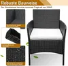 A close-up marketing image of a black rattan armchair with a white cushion, featuring text overlays highlighting its features and construction. Anteprima dell’immagine prodotto