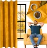 A collage showing a yellow curtain, a window with a view of trees, and a man relaxing in a yellow armchair. Produktbild-Vorschau