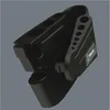 A black tool holder with multiple circular slots for tools. Náhled obrázku produktu