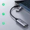 A UGREEN video capture card connected to a laptop. Náhled obrázku produktu