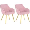 Two pink velvet armchairs with gold metal legs, displayed against a white background.
