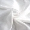 A close-up, swirled view of white, sheer fabric, likely an outdoor curtain. Produktbild-Vorschau