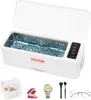 A collage featuring a white ultrasonic cleaner with items being cleaned, and a collection of other items below. Voir les images du produit