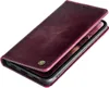 A burgundy leather flip phone case is shown on a white background. Produktbild-Vorschau