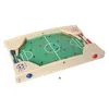 A wooden tabletop soccer game with red and blue player pieces and a silver ball. Produktbild-Vorschau