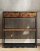 A narrow console table with two fabric drawers and a metal frame, set against a textured gray wall and wooden floor. Náhled obrázku produktu