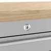 A close-up of a lock on a metal drawer of a workbench. Produktbild-Vorschau
