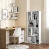 A home office setup with a desk, chair, and bookshelf. Produktbild-Vorschau