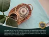 A teapot and a small plant are placed on a woven tray on top of a light blue waffle-textured blanket. Produktbild-Vorschau