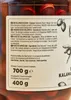 A close-up of a glass jar containing Kalamata olives, with a label showing nutritional and ingredient information in multiple languages. Produktbild-Vorschau