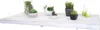 A white wooden shelf with various potted plants and decorative vases. Produktbild-Vorschau