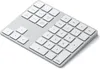 A close-up, isometric view of a silver numeric keypad. Voir les images du produit