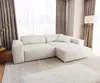 A modern living room with a large sectional sofa.