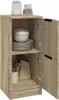 A wooden cabinet with two doors, one open, showing shelves with dishes and kitchen utensils. Podgląd zdjęcia produktu