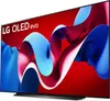 A television screen displaying abstract colorful shapes on a red background. Produktbild-Vorschau