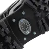 Close-up of the sole of a black boot, showing the tread pattern and a metal emblem. Náhľad obrázku produktu