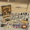 A tabletop board game setup with miniatures, game boards, cards, and the game box. Anteprima dell’immagine prodotto