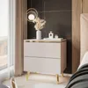 A modern bedroom setting with a nightstand next to a bed. Produktbild-Vorschau