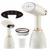 A product shot of a handheld garment steamer and its accessories, arranged on a white background. Produktbild-Vorschau