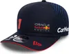 A close-up studio shot of a navy blue baseball cap with Red Bull Racing branding. Produktbild-Vorschau