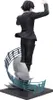 A figurine of a person in a suit, standing on a musical staff base. Produktbild-Vorschau